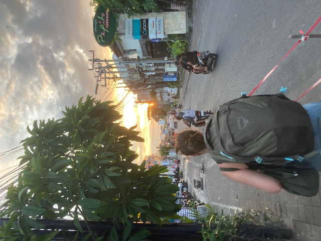 Rose backpacking at sunset.